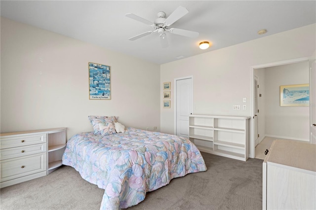 bedroom with light carpet and ceiling fan