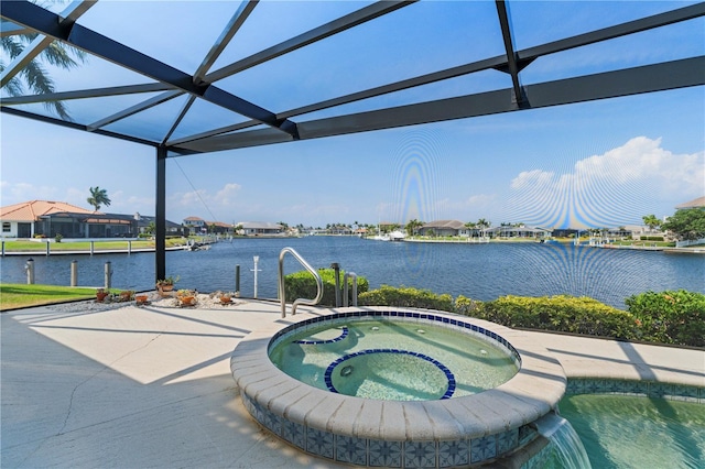 view of swimming pool with a patio, an in ground hot tub, a water view, and a lanai