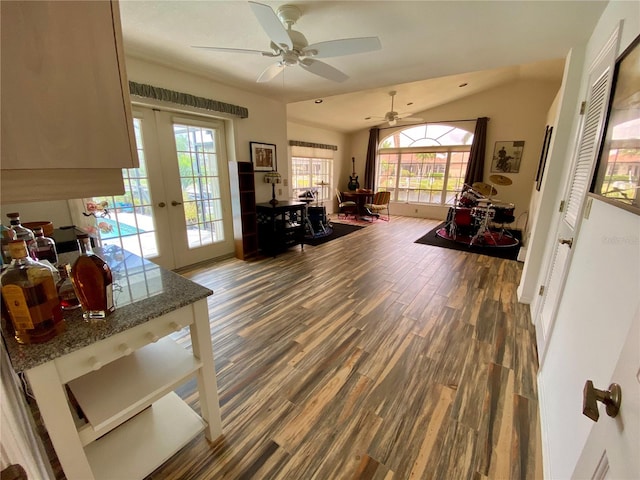 living room with ceiling fan, french doors, and hardwood / wood-style floors