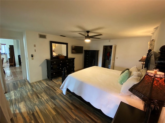 bedroom featuring ceiling fan and hardwood / wood-style floors