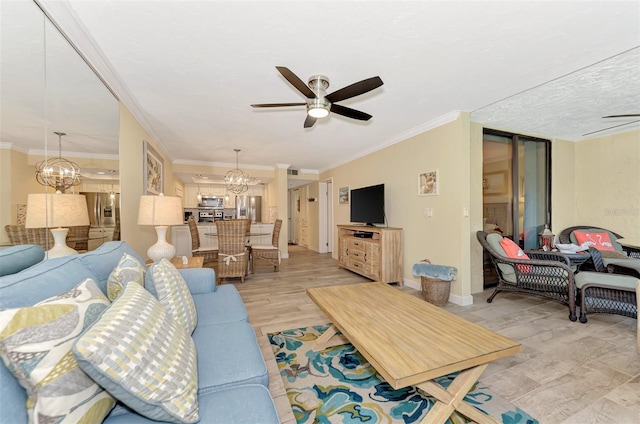 living room featuring ceiling fan with notable chandelier, ornamental molding, and light hardwood / wood-style floors