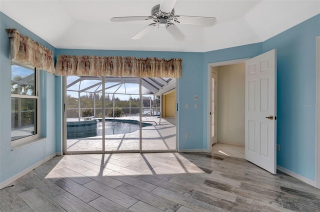 interior space with ceiling fan and light hardwood / wood-style flooring