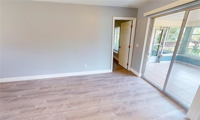 empty room with light wood-type flooring