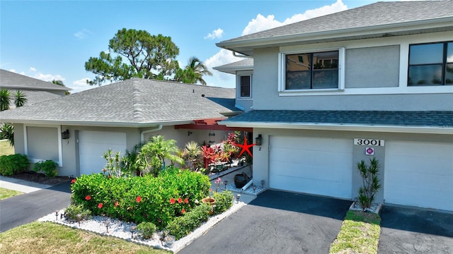 view of front of home with a garage