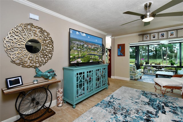 living room featuring tile floors, ceiling fan, a textured ceiling, and crown molding