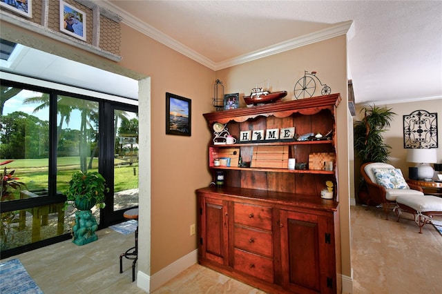 interior space featuring ornamental molding and light tile floors