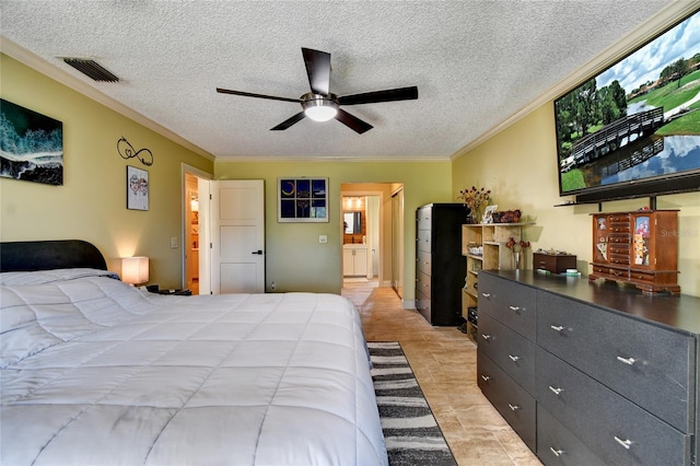 bedroom featuring ceiling fan, a textured ceiling, light tile flooring, and ornamental molding