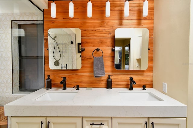 bathroom with oversized vanity, double sink, and wooden walls