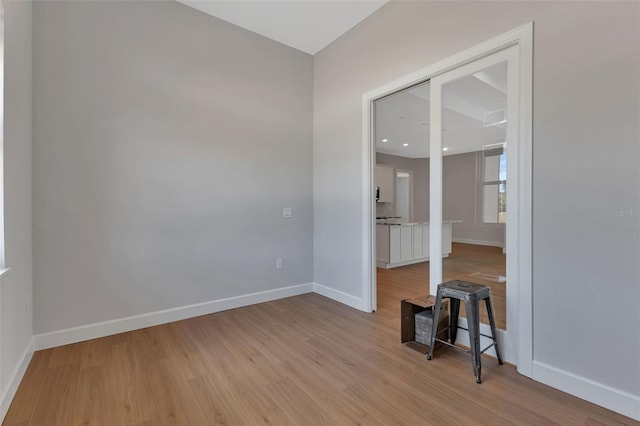 empty room with light wood-type flooring