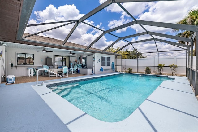 view of swimming pool featuring an outdoor hangout area, a lanai, a patio, and ceiling fan