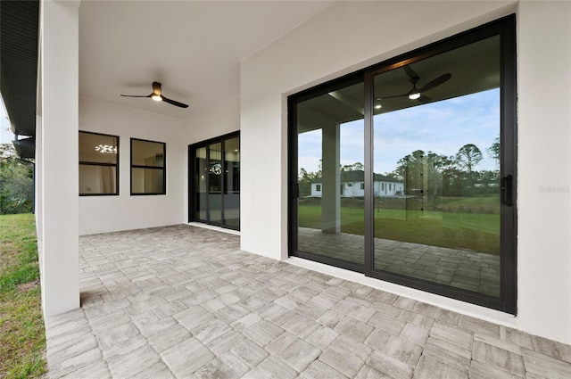 view of patio with ceiling fan