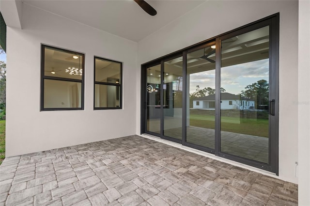 view of patio with ceiling fan