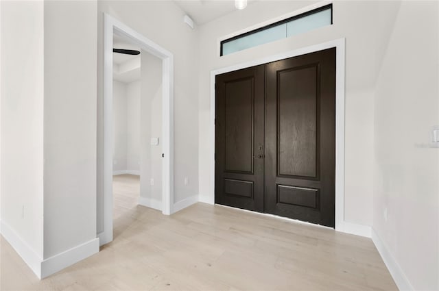 entrance foyer featuring light hardwood / wood-style floors