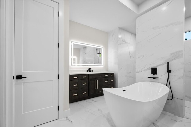 bathroom featuring vanity and a bathing tub