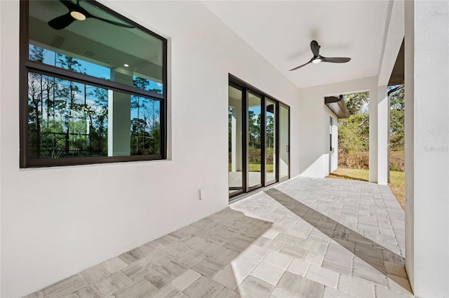 view of patio with ceiling fan