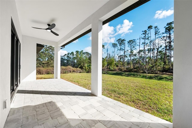 view of patio with ceiling fan