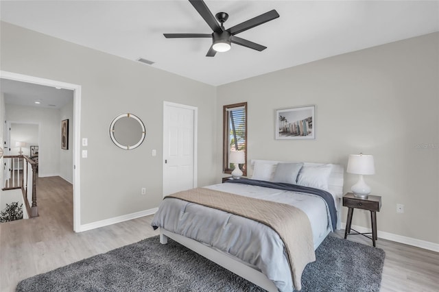 bedroom featuring ceiling fan and wood-type flooring