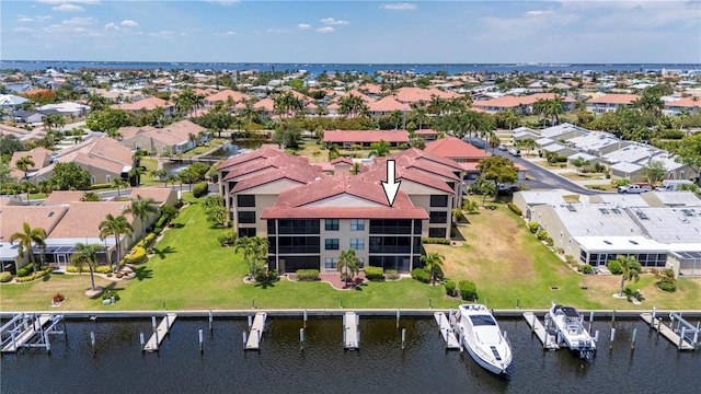 drone / aerial view with a water view