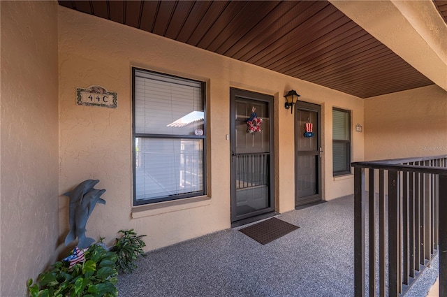 doorway to property with a porch