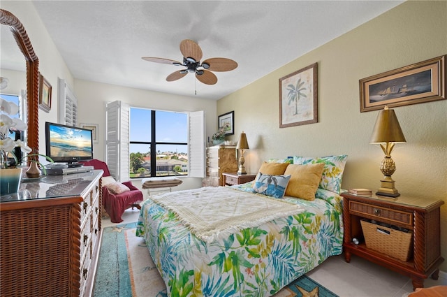 bedroom featuring ceiling fan