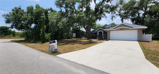 single story home with a garage