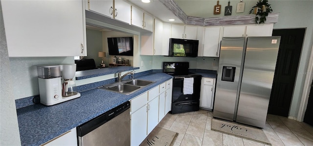 kitchen featuring white cabinetry, light tile patterned floors, sink, and black appliances