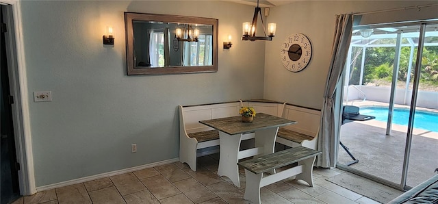 dining space featuring a chandelier