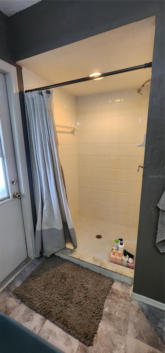 bathroom featuring walk in shower