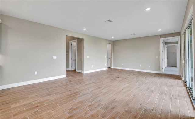 empty room featuring light hardwood / wood-style floors