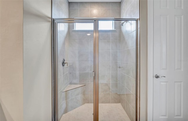 bathroom with an enclosed shower