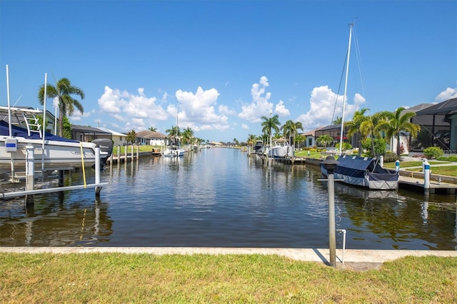 dock area featuring a water view and boat lift