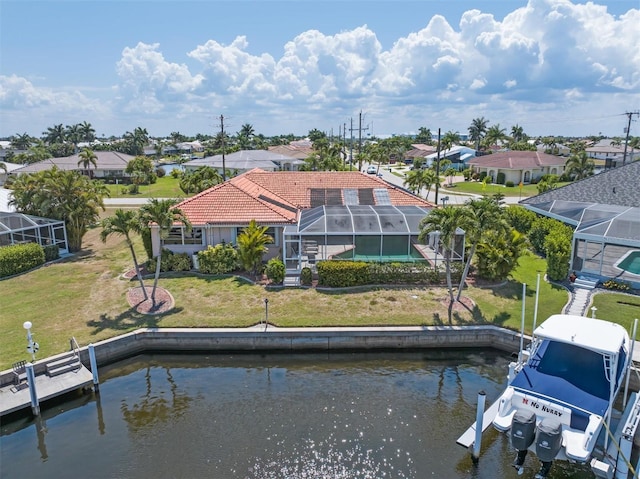 bird's eye view featuring a residential view and a water view