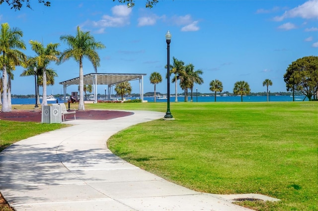 view of home's community featuring a water view, a yard, and a gazebo