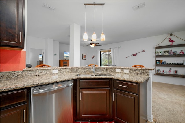 kitchen with ceiling fan, light stone counters, sink, carpet, and dishwasher