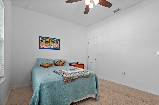 bedroom featuring ceiling fan and carpet floors