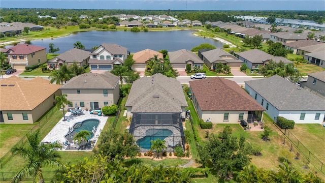 drone / aerial view with a water view