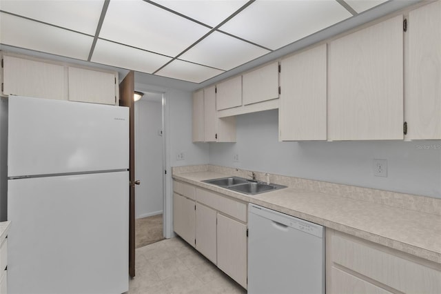 kitchen with sink and white appliances