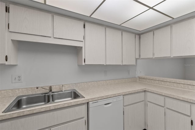 kitchen with white dishwasher and sink