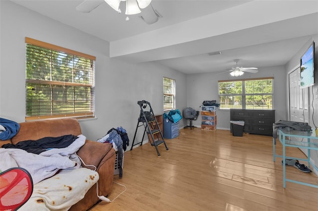 interior space with ceiling fan and light wood-type flooring