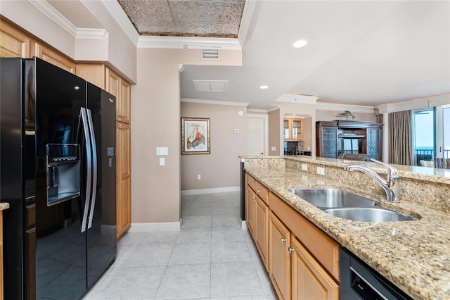 kitchen with black refrigerator with ice dispenser, sink, crown molding, and dishwashing machine