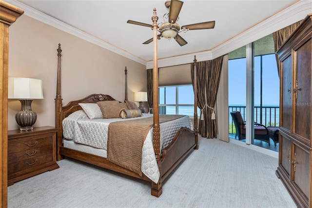 bedroom with access to exterior, ceiling fan, ornamental molding, and a water view