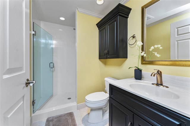 bathroom featuring tile patterned flooring, a shower with shower door, toilet, vanity, and crown molding