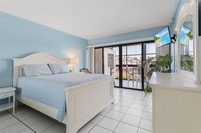 tiled bedroom featuring access to exterior