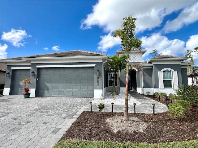 view of front of home with a garage