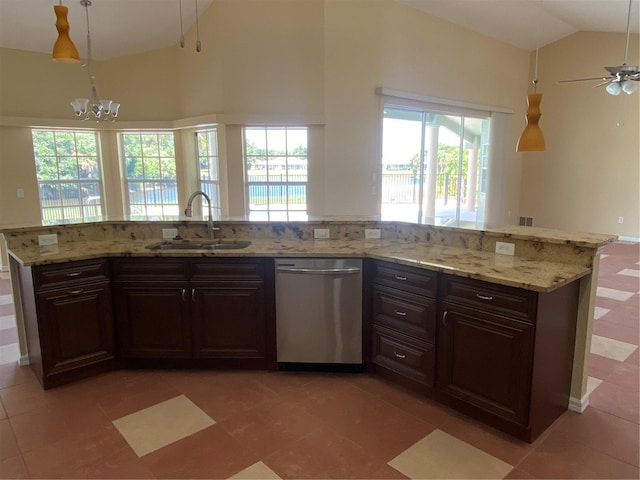 kitchen with sink, dark brown cabinets, stainless steel dishwasher, and vaulted ceiling