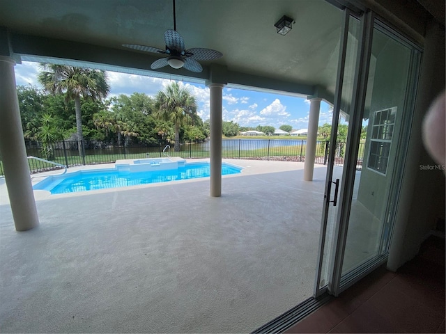 view of pool featuring a patio area and ceiling fan