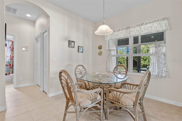 dining room with light tile patterned flooring