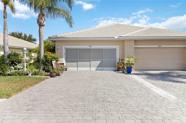 view of front of property featuring a garage