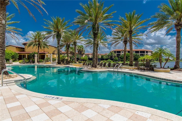 view of pool featuring a patio area