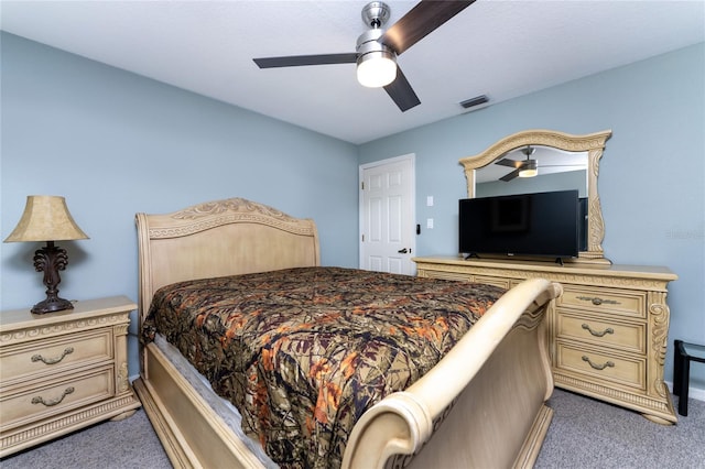 bedroom featuring ceiling fan and carpet flooring